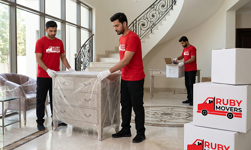 Carefully wrapped furniture being moved